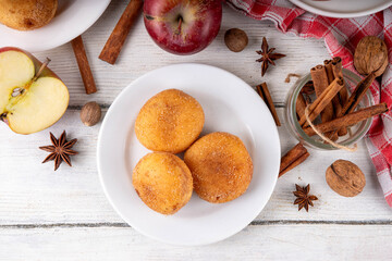 Tasty homemade apple pie autumn tasty donuts with cinnamon sugar glazing