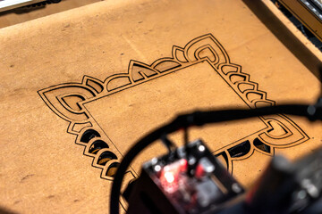 Laser engraving and cutting, using reclaimed wood, upcycling concept