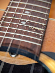 closeup of an acoustic guitar with details