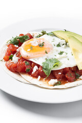 Huevos Rancheros isolated on white background. Traditional Mexican breakfast.