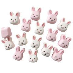 A collection of cute marshmallow bunny candies in pink and white colors arranged on a black background