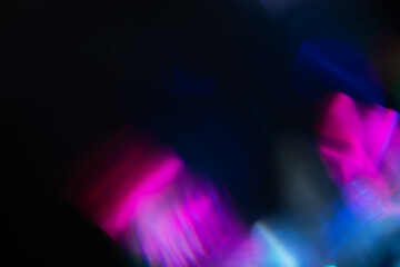 Abstract blurred colorful lens flare bokeh on black, © eliosdnepr