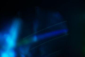 Colorful light leak on black background, abstract design with optical lens flare shot on a long lens