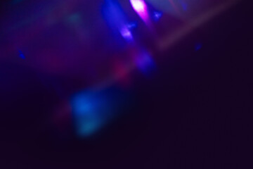 Blurred Light painting one exposure in camera. light glares with a spectral gradient on a dark...