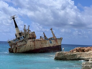 Photograph of a rusting, abandoned and stranded ship off the coast of Cyprus. Paphos, Cyprus, March...