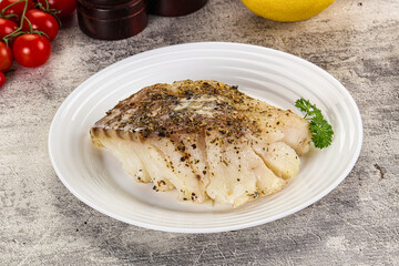Baked cod fish fillet with spices