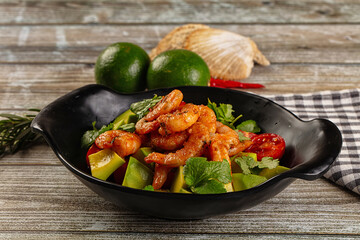 Dietary salad with shrimps and avocado