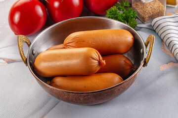 Boiled pork sausages for breakfast