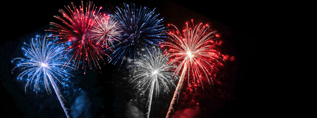 Fototapeta na wymiar Independence Day 4th of July USA - Red blue white firework banner, silvester new year's eve, new year fireworks isolated on black night sky texture