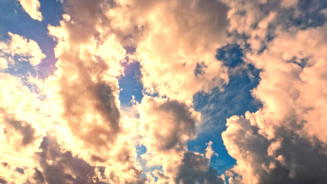 cute sunrise goldish clouds on the sky background - photo of nature