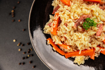 Rice meat and vegetables pilaf fresh delicious gourmet food background on the table rustic food top view copy space