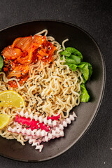 Noodle Bowl vegan fresh delicious gourmet food background on the table rustic food top view copy space keto and paleo diet vegan and vegetarian food