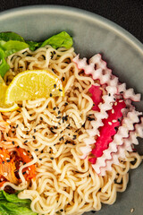 Noodle Bowl vegan fresh delicious gourmet food background on the table rustic food top view copy space keto and paleo diet vegan and vegetarian food