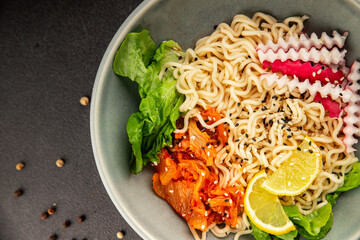 Noodle Bowl vegan fresh delicious gourmet food background on the table rustic food top view copy space keto and paleo diet vegan and vegetarian food