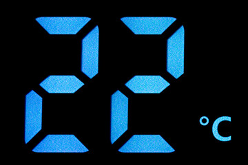 Twenty two degrees Celsius on a digital thermometer close-up