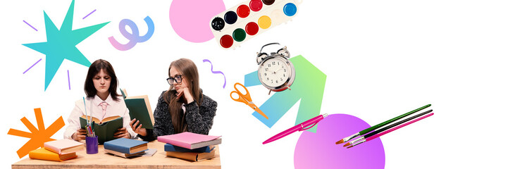 Two teenage girls focus on books at a cluttered desk filled with supplies like brushes, pens, and...