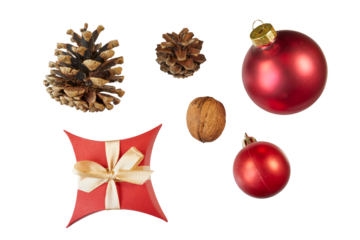 christmas decoration set with red xmas balls, walnut, pine cone and gift box isolated on white or transparent png