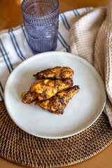 recipe of chicken wings with golden spices in the oven