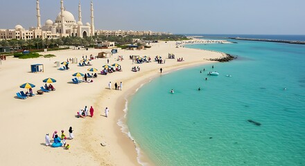 Obraz premium Serene beach scene with turquoise water, white sand, people enjoying leisure time and grand architecture backdrop