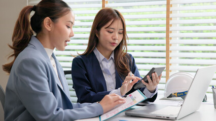 Expert woman asian people discuss review data number costing managerial account prepare monthly actual cost variance report income tax at audit office. ESG budget control ERP process service project.