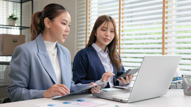 Expert woman asian people discuss review data number costing managerial account prepare monthly actual cost variance report income tax at audit office. ESG budget control ERP process service project.