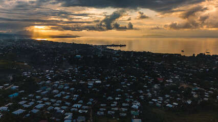 Golden reflections as seen above the city of Honiara.