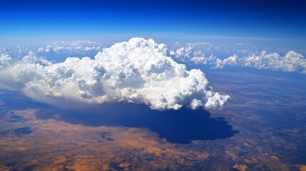 Fluffy white cumulus clouds seen from above