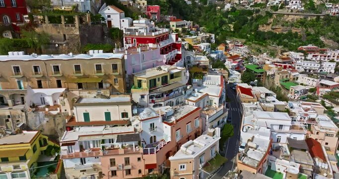 Aerial view of Positano, Amalfi. Colourful houses of the famous resort town of Positano in southern Italy on a summer day