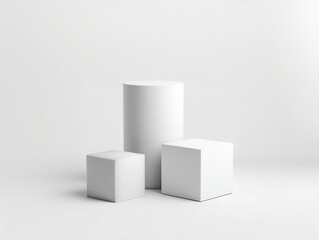 Three white boxes are stacked on top of each other. The boxes are white and square in shape