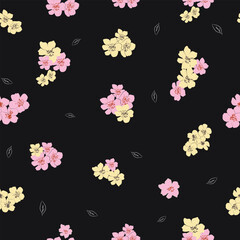 Seamless floral pattern with pink and yellow florals blossoms on black background for elegant textile and surface design



