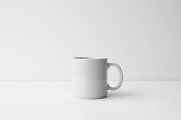 Obraz premium Plain white mug isolated on dark white background