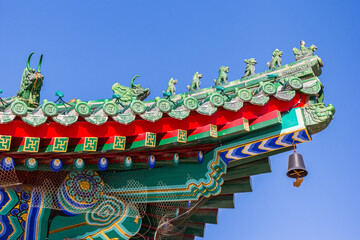 Decorated roof charms on a temple in the Dabei Monastery in Tianjin, China
