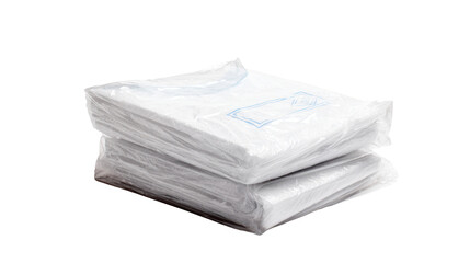 Stack of neatly packaged white T-shirts on transparent plastic wraps, isolated on white.