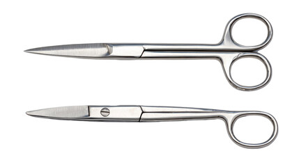 Fototapeta premium Two pairs of stainless steel scissors on white background.