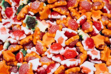 Colorful background with gummy turtle candies, fun and vibrant jelly sweets.