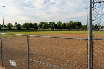 a view from the third baseline bleechers of the second baseball infield and outfield