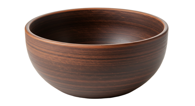 A brown bowl stands on a black background showcasing a unique rustic design