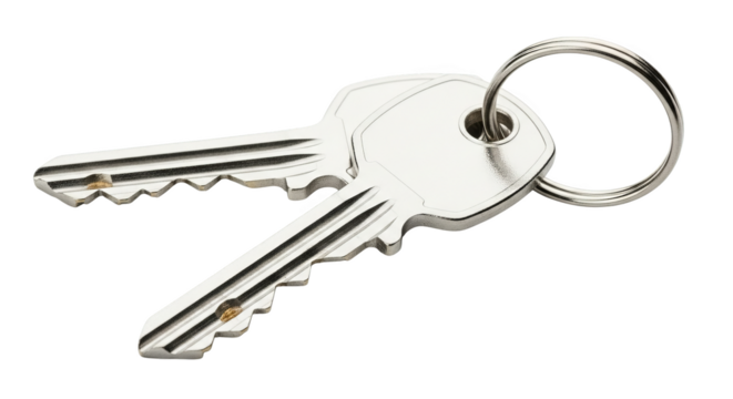 Pair of shiny metal keys attached to a key ring create sense of security and access,isolated.