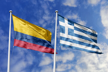 Colombia and Greece flags proudly waving against a bright blue sky, symbolizing international friendship, diplomatic ties, and the rich cultural exchange between nations.
