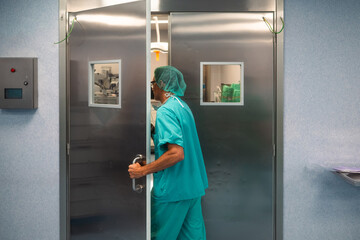 Surgeon entering the operating room