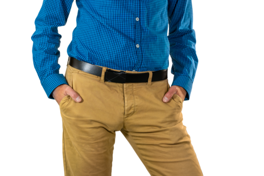 Man in casual blue shirt and khakis with hands in pants pockets standing casually, representing comfort or confidence. Isolated