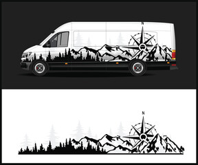 Modern white van with a featuring a compass rose and mountainous forest landscape © MdAbdullah