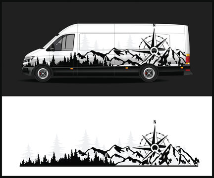 Modern white van with a featuring a compass rose and mountainous forest landscape