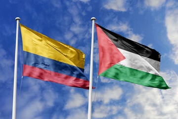 Waving flags of Colombia and Palestine against a vibrant blue sky, symbolizing international...