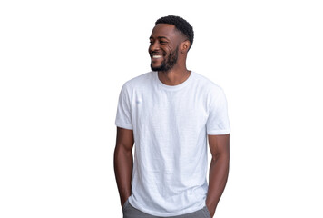 A smiling man in a casual white t-shirt stands against a light gray background. exuding confidence and warmth. ideal for lifestyle or fashion-related content