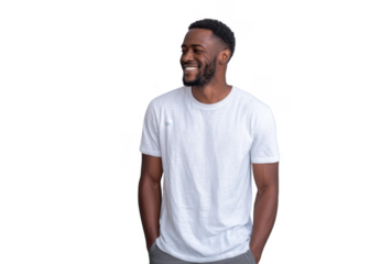 A smiling man in a casual white t-shirt stands against a light gray background. exuding confidence and warmth. ideal for lifestyle or fashion-related content