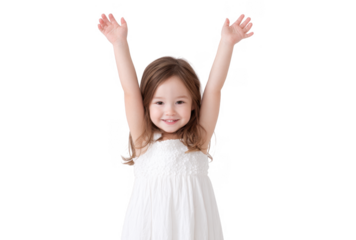 A joyful young girl with long hair wearing a white dress. raising her arms in celebration against a plain background. capturing a moment of happiness and innocence suitable for family-oriented theme