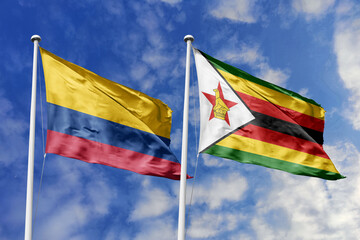 The Colorful Flags of Colombia and Zimbabwe Waving Together Under a Bright Blue Sky, Symbolizing...