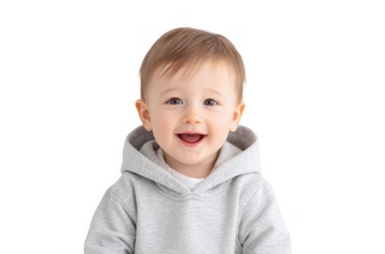 A cheerful toddler wearing a gray hoodie smiles brightly against a minimalist white background. capturing a moment of joy and innocence. ideal for family or parenting themes