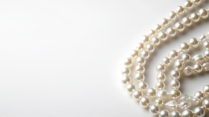 Obraz premium Elegant White Pearl Necklace on Soft Light Background